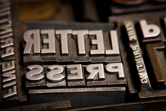 a close up of a type of metal type