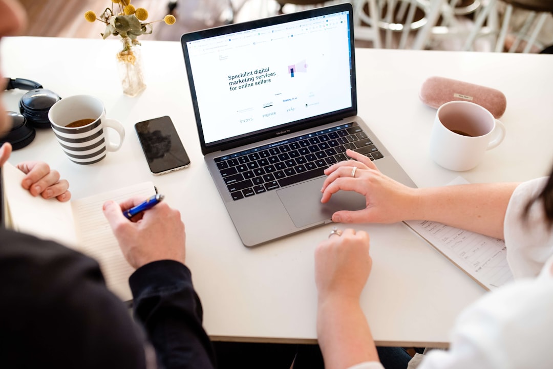Man and Woman working together on a Marketing Strategy