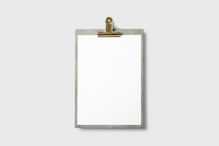 Blank paper form on a clipboard with a pen, representing website contact form fields